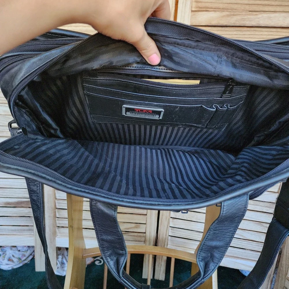 Tumi black leather